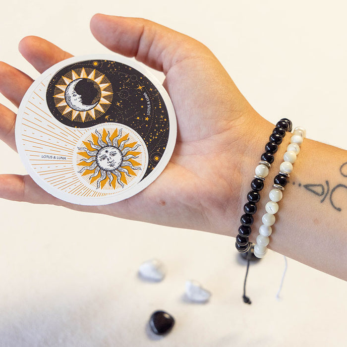 Yin to My Yang Bracelet Stack, worn with yin yang coaster